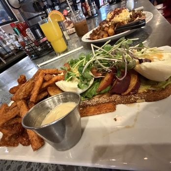 Toast Coffeehouse - Burrata Caprese Avocado Toast - Coffee & Tea Near Me - Patchogue, New York Toast Coffeehouse - Burrata Caprese Avocado Toast - Coffee & Tea Near Me - Patchogue, New York