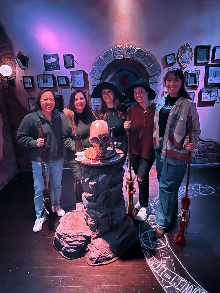 Stained Hourglass Escapes Logo