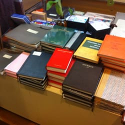 Pentimento Papeterie - Stacks of journals.