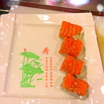 DKY Sushi - This is WKO roll. I never had raw fish before. Here's fresh salmon is amazing.... - Japanese Near Me - Ann Arbor, Michigan