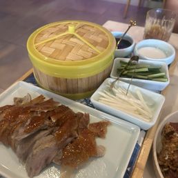 Half Peking duck that took 40 min to get. No flavor and served lukewarm for $58 plus $10 dollars to fry bones that we didn't really want.