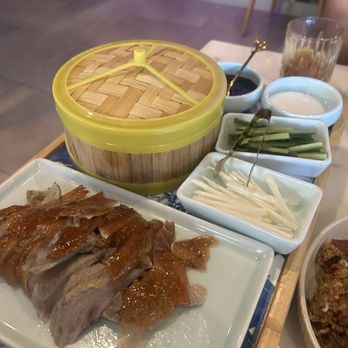 Lulu Modern Chinese - Half Peking duck that took 40 min to get. No flavor and served lukewarm for $58 plus $10 dollars to fry bones that we didn't really want. - Chinese Near Me - Plano, Texas