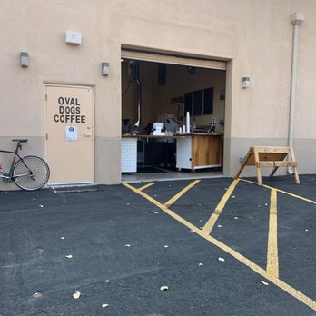 Oval Dogs Coffee - a bicycle parked in front of a coffee shop - Coffee Roasteries Near Me - Rio Rancho, New Mexico
