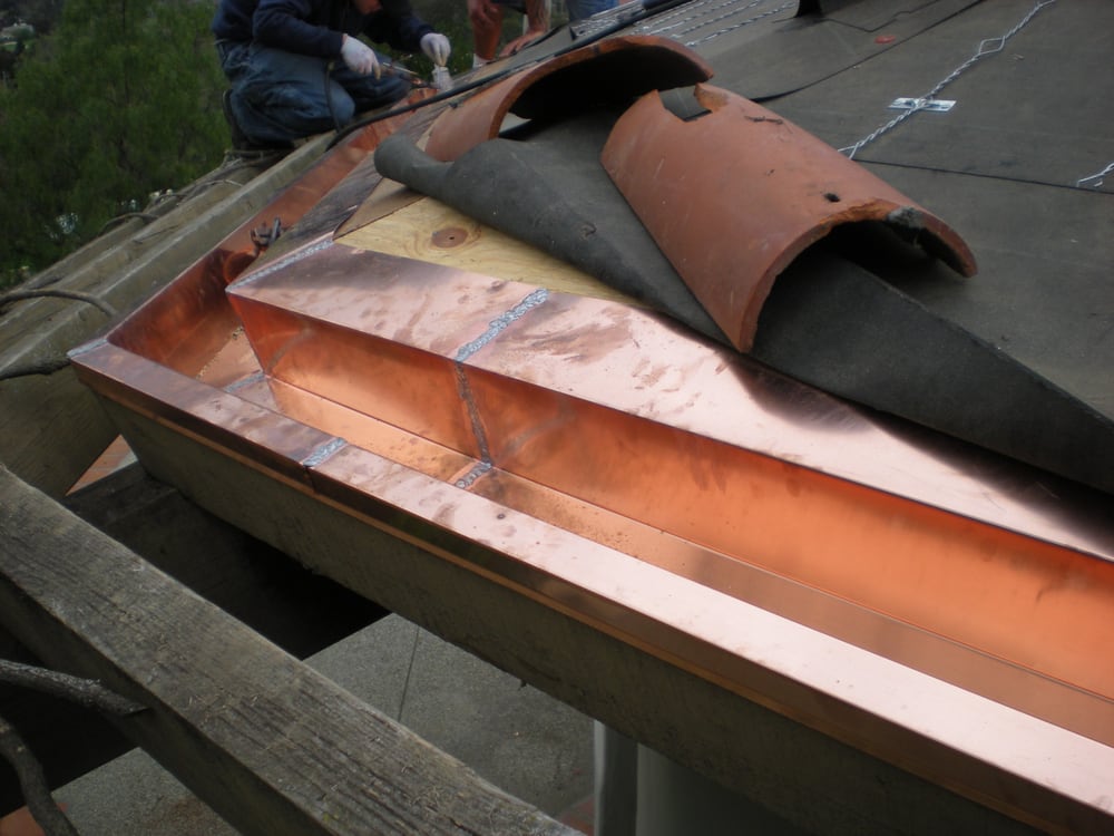 Slide of Action Roofing