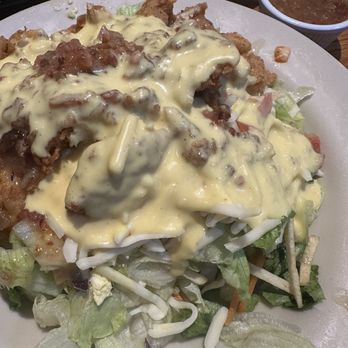 Raffertys Restaurant & Bar - Chicken fingers salad with Hot Bacon Dressing and honey mustard - New American Near Me - Clarksville, Tennessee Raffertys Restaurant & Bar - Chicken fingers salad with Hot Bacon Dressing and honey mustard - New American Near Me - Clarksville, Tennessee
