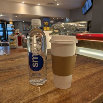 Lavazza Espression - Glaceau smartwater ($5) and large Orange Mocha Mio ($6) made with almond milk (+$1) from Lavazza Espression inside The Drake Hotel Chicago. - Coffee & Tea Near Me - Chicago, Illinois