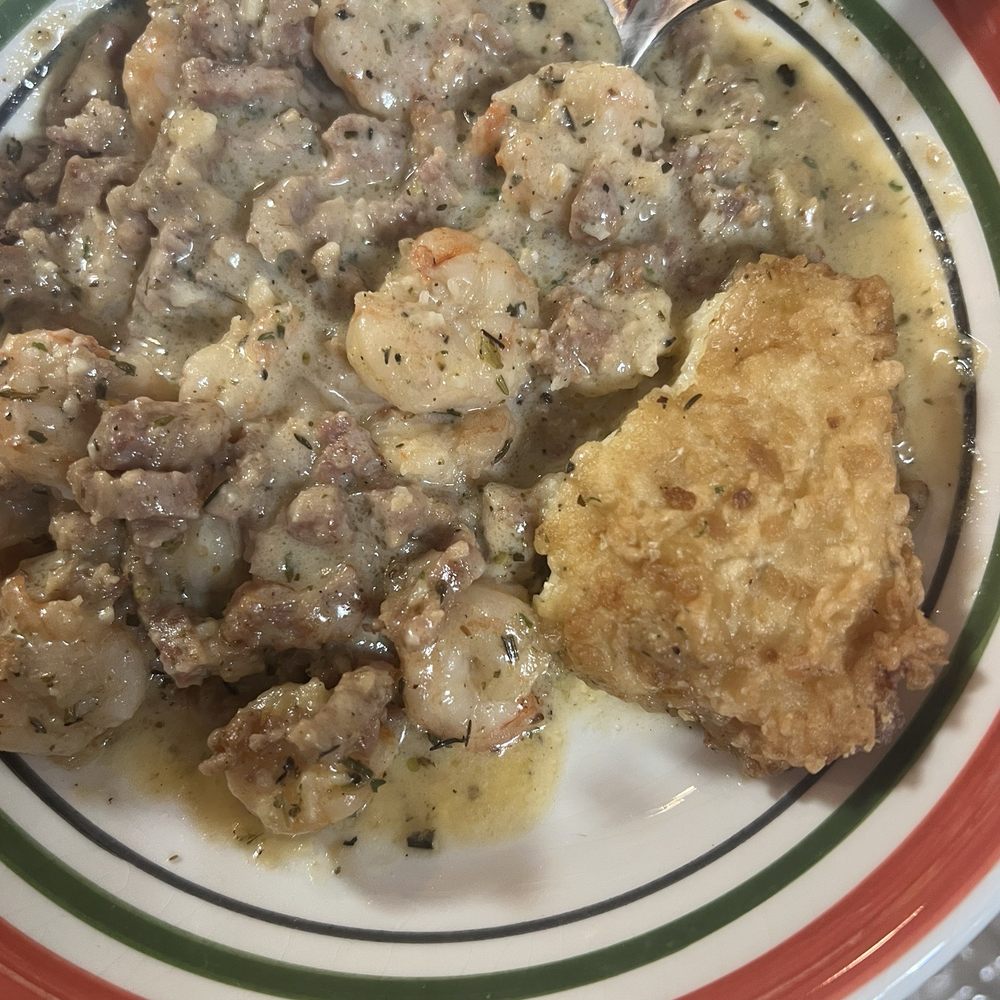 Shrimp and Grits with smoked sausage.