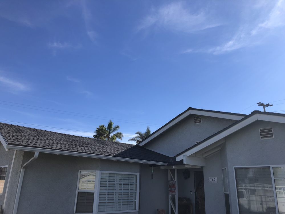 Slide of E And R Roofing