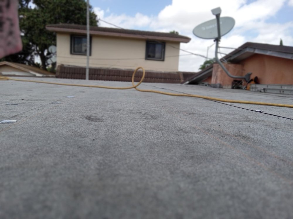 Slide of SGCI Roofing Division