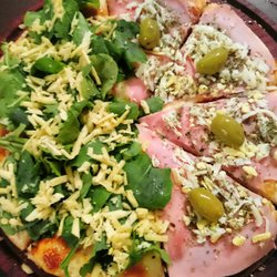 Las Piedras - Pizza finita y muy crocante.