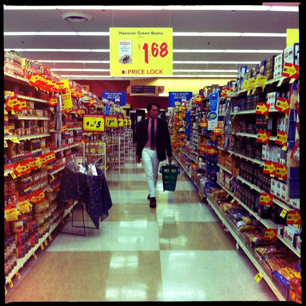 Bi-Lo - a man walking down a grocery aisle - Drugstores Near Me - Hephzibah, Georgia