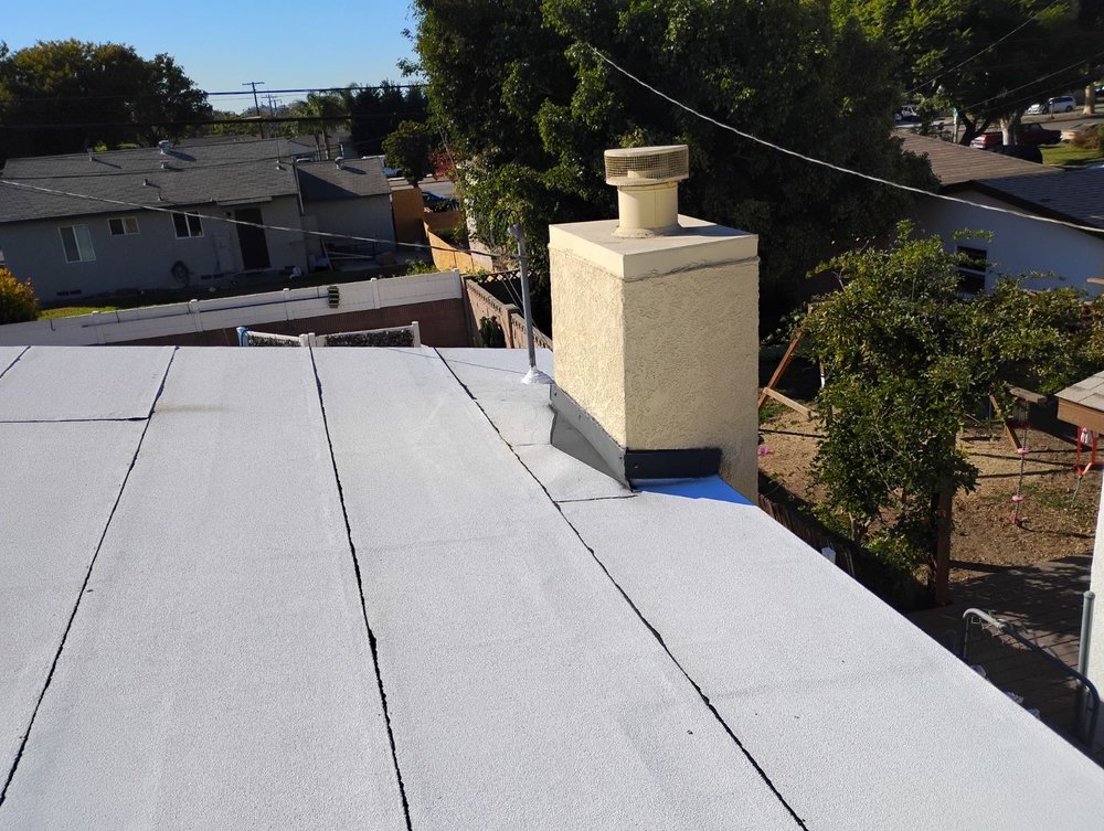 Slide of Sam's Roofing Co