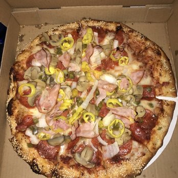 Steis's Village Inn - Deluxe, with banana peppers and sesame crust - Bars Near Me - Lexington, Michigan