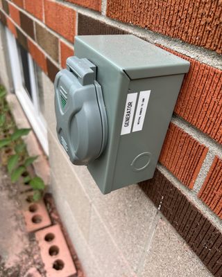 Out-and-Out Electrician Service Logo