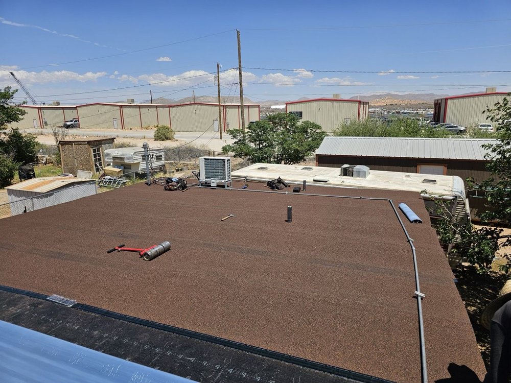 Slide of Sagan Commercial Roofing