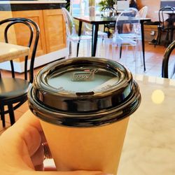 The Good Witch Coffee Bar - Vanilla latte in their bright and cheery space
