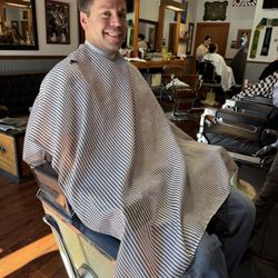 Heritage Barbershop - Rustic barber vibe. A little sports memorabilia but mostly vintage.