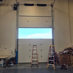Sawtooth Garage Doors - Section replacement amd balancing the door.