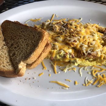 Egg Haven - Meat Lover's Omelette with wheat toast - Breakfast & Brunch Near Me - Winter Haven, Florida Egg Haven - Meat Lover's Omelette with wheat toast - Breakfast & Brunch Near Me - Winter Haven, Florida