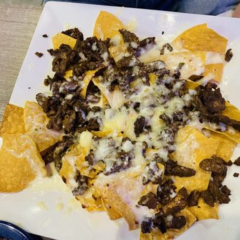 Uncle Paco's - Steak Nachos - Mexican Near Me - Owasso, Oklahoma Uncle Paco's - Steak Nachos - Mexican Near Me - Owasso, Oklahoma