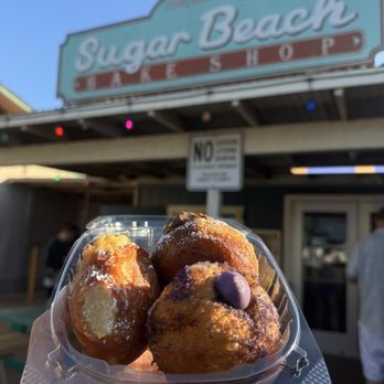 Sugar Beach Bake Shop - Coconut, ube and chocolate Malasadas - Desserts Near Me - Kihei, Hawaii Sugar Beach Bake Shop - Coconut, ube and chocolate Malasadas - Desserts Near Me - Kihei, Hawaii
