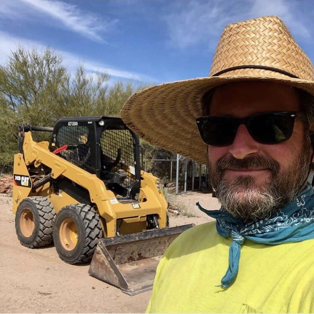 Brewer Earth Movers - Photo of one of the owners with his Bulldozer on another job site - General Contractors Near Me Brewer Earth Movers - Photo of one of the owners with his Bulldozer on another job site - General Contractors Near Me