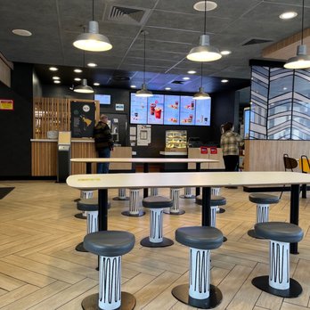 McDonald's - tables and stools in a restaurant - Burgers Near Me - Vernon, Connecticut McDonald's - tables and stools in a restaurant - Burgers Near Me - Vernon, Connecticut