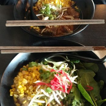 ZENSTREET - Front is the sober with added egg, corn and spinach. Back is anonymous and the beef in this one is really good. - Thai Near Me - Riverside, California
