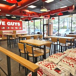 Five Guys - Interior photograph of the dining room of the Five Guys restaurant located at 10645 West Broadway Street in Pearland, Texas.