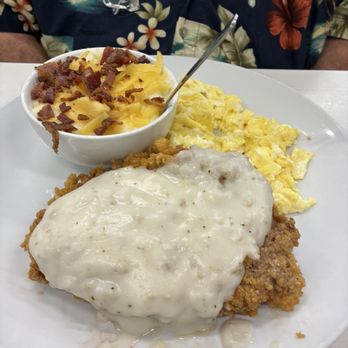 Lake Highlands Cafe - Chicken Country Fried Steak with eggs and smoky grits. - Breakfast & Brunch Near Me - Dallas, Texas Lake Highlands Cafe - Chicken Country Fried Steak with eggs and smoky grits. - Breakfast & Brunch Near Me - Dallas, Texas
