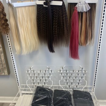 The Perfect Touch Master Hair Extensions  - She has her own hair extensions line - Hair Salons Near Me - Orange City, Florida