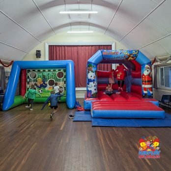 Airplay Inflatables - Football themed bouncy castle package. Features a 15x11ft bouncy castle and inflatable penalty shootout game. - Bounce House Rentals Near Me - Bexhill, ESX