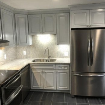 J Ventura Contracting - a kitchen with stainless steel appliances - Roofing Near Me J Ventura Contracting - a kitchen with stainless steel appliances - Roofing Near Me