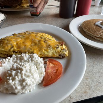 Cobian's Restaurants - Trio (3 breakfast meats) & Cheese Omelette, cottage cheese & pancakes. - Mexican Near Me - Cypress, California Cobian's Restaurants - Trio (3 breakfast meats) & Cheese Omelette, cottage cheese & pancakes. - Mexican Near Me - Cypress, California