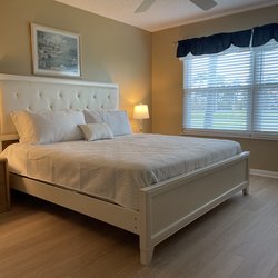 Sandy Beach Vacation Rentals - Master bedroom of one of our units with a king size bed.