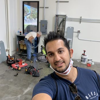 Amps Electric AC/DC - Me taking a selfie  while they work!! Lol - Solar Installation Near Me