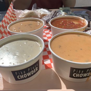 Pike Place Chowder - 4-Sampler Feast (clockwise): Smoked Salmon Chowder Manhattan Style Chowder Seafood Bisque New England Clam Chowder - Seafood Near Me - Seattle, Washington Pike Place Chowder - 4-Sampler Feast (clockwise): Smoked Salmon Chowder Manhattan Style Chowder Seafood Bisque New England Clam Chowder - Seafood Near Me - Seattle, Washington
