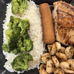 The Little Grill And Chill - Salmon, shrimp, broccoli & rice with fried bread