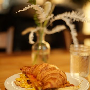 Whealth Kitchen - Bacon egg & cheese on a croissant w/ Sriracha - Breakfast & Brunch Near Me - Jersey City, New Jersey