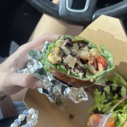 Spinach wrap breakfast burrito with bacon