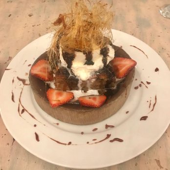 Bocaditos Bistro - Nutella bread pudding - which we devoured in only a few minutes! - Breakfast & Brunch Near Me - New York, New York Bocaditos Bistro - Nutella bread pudding - which we devoured in only a few minutes! - Breakfast & Brunch Near Me - New York, New York