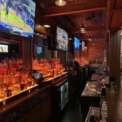 Paddy Murphy’s Irish Pub - Long Bar of Spirits and Big TVs