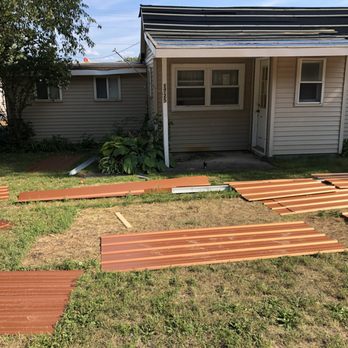 Northern Michigan Services - Dead grass from roofing supplies sitting there for weeks. - Roofing Near Me - Alba, Michigan