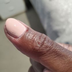 Happy Nails  - This is immediately following my nail service- and my hands & nails look terrible!