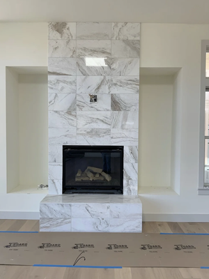 Fireplace Tiling - Explore Pacific Coast Tile’s standout fireplace projects. This portfolio features expertly crafted tilework that enhances the heart of the home, blending style and craftsmanship. Each fireplace is a reflection of our skill in transforming ordinary spaces into stunning focal points with unique, durable tile finishes. Fireplace Tiling - Explore Pacific Coast Tile’s standout fireplace projects. This portfolio features expertly crafted tilework that enhances the heart of the home, blending style and craftsmanship. Each fireplace is a reflection of our skill in transforming ordinary spaces into stunning focal points with unique, durable tile finishes.