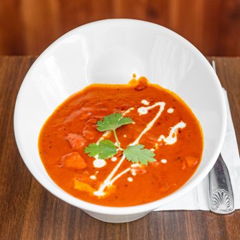 Avon Indian Grill - Chicken tikka masala is a dish consisting of roasted marinated chicken chunks in spiced gravy. The gravy is usually creamy and orange-colour - Indian Near Me - Avon, Connecticut