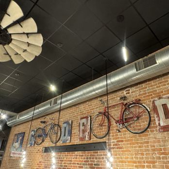 Comet Chicken - Decor when bikes serve as letter genius. - Chicken Shop Near Me - Fort Collins, Colorado Comet Chicken - Decor when bikes serve as letter genius. - Chicken Shop Near Me - Fort Collins, Colorado