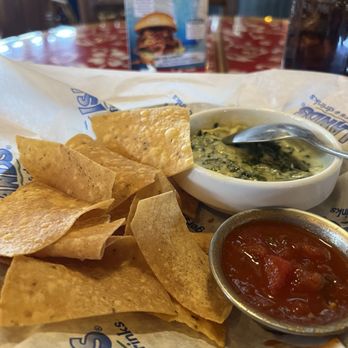 Islands Restaurant - The Happy Hour Spinach Artichoke Dip with a side of Salsa. - Burgers Near Me - Corona, California