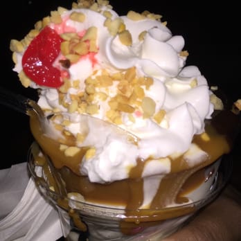 Hole in the Wall Custard Shoppe - French Vanilla Frozen Yogurt Sundae - turtle topping (caramel and chocolate), whipped cream, nuts and a cherry $3.75 - Ice Cream & Frozen Yogurt Near Me - Oak Park, Illinois Hole in the Wall Custard Shoppe - French Vanilla Frozen Yogurt Sundae - turtle topping (caramel and chocolate), whipped cream, nuts and a cherry $3.75 - Ice Cream & Frozen Yogurt Near Me - Oak Park, Illinois
