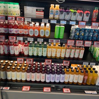 Avril - a variety of beverages on display in a grocery store - Organic Stores Near Me - Montreal, Quebec